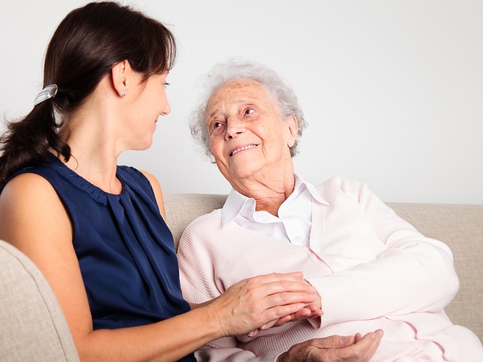 A Senior Woman with her Caregiver Highlighting Dementia Care at a Memory Care Facility in Bossier City, LA