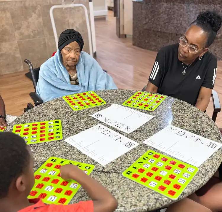 Group of older people playing bingo at a nursing home in Bossier City, LA