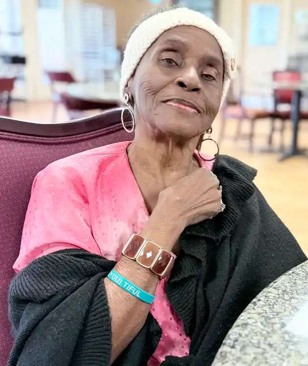 An elderly woman posing for the camera at a nursing home in Bossier City, LA
